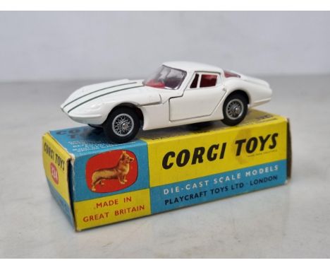 A boxed Corgi Toys No.324 Marcos 1800 GT with leaflet, Nr M-M, box Ex 