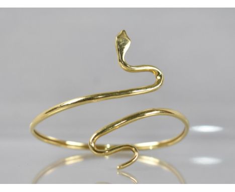 An 18ct Gold Bangle Modelled as a Coiled Serpent Having Polished Tapered Body, Stamped to Reverse of Head N4 750, 11.2gms 