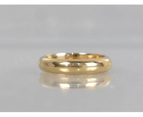 An 18ct Yellow Gold Wedding Band, Polished D Shape, Size K, Stamped to the Interior 750, Two other Marks Illegible, 5.1gms 