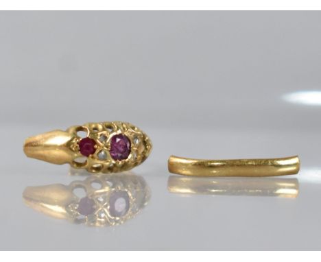 An 18ct Gold, Ruby and Diamond Boat Shaped Ring, Central Mixed Cushion Cut Stone 3.2mm Diameter Having Four Small Rose Cut Di