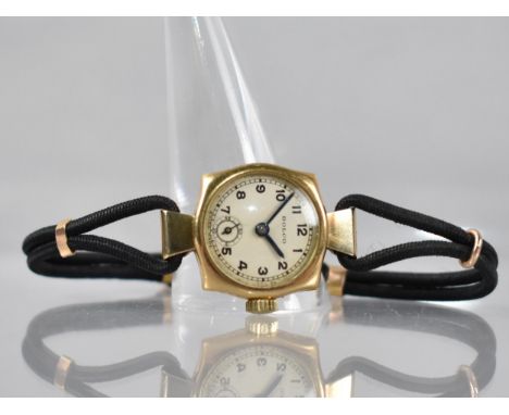 An 18ct Gold Cased Rolco Ladies Wristwatch, Silvered Dial with Arabic Numerals and Subsidiary Seconds Indicator, Marked Rolco