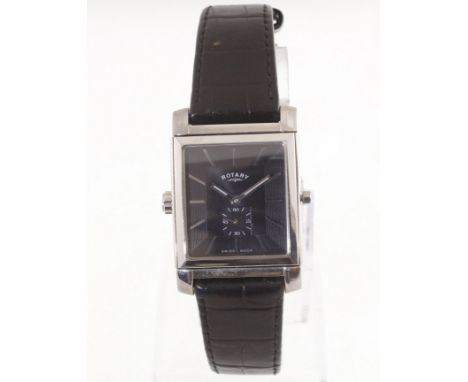 A modern stainless steel ROTARY reverso style wristwatch with night & day dials, quartz (not working), with original box & un