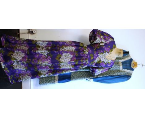 A pair of 1970s dresses. A 1970s HELMUT ETGES dress in purple floral print. Puffed sleeves and full length. Good condition, s