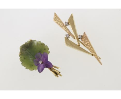 A 1970's abstract diamond set brooch, marked 585 together with a jade & diamond set floral brooch stamped 585, together appro