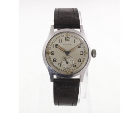 A MOERIS military stainless steel manual-wind shock absorber wristwatch on a black leather strap, stamped ATP-P3700, working