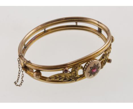 An Edwardian 9ct ruby & rose-cut diamond hinged bangle, H/M Birmingham 1907 & approx 11.4gms