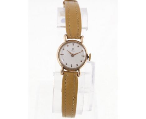 A ladies TUDOR rose gold wristwatch, with a working manual-wind 17 jewel movement on a modern leather strap, stamped 10k