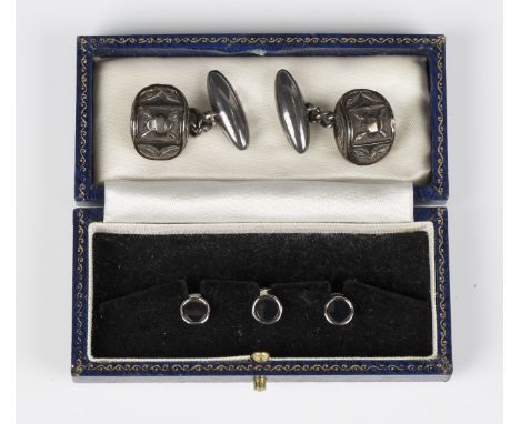 A set of three 9ct white gold and black onyx dress studs, Birmingham 1964, weight 2.9g, cased, and a pair of cufflinks with p