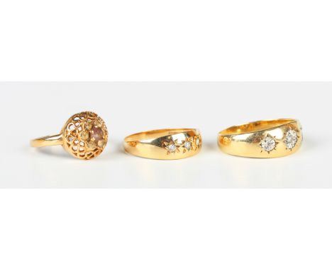 A 9ct gold and diamond three stone ring, Sheffield 2000, ring size approx U1/2, a 9ct gold and colourless gem set three stone