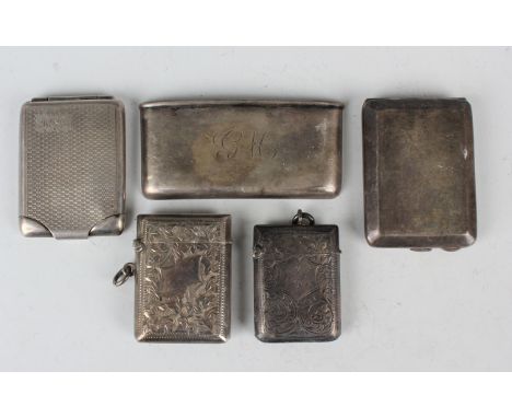 Two silver vesta cases, each with engraved foliate decoration, Birmingham 1900 and 1904, a silver curved rectangular card cas