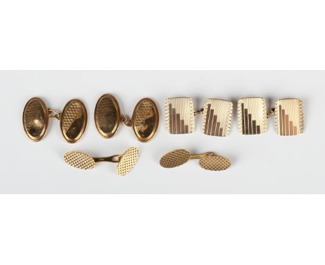 A pair of 9ct gold rectangular cufflinks with engine turned decoration, Birmingham 1936, dimensions of each front 1.5cm x 1.1