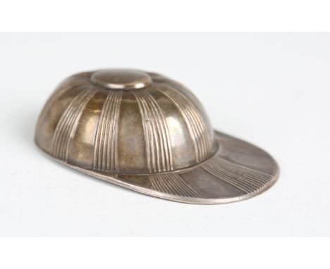 An Edwardian silver novelty caddy spoon in the form of a jockey's cap with reeded radiating bands, Sheffield 1908 by Thomas B