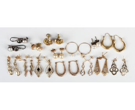 Ten pairs of gold earrings and earstuds, including a pair of 9ct gold and blue gem set pendant earrings, length 3.3cm, total 