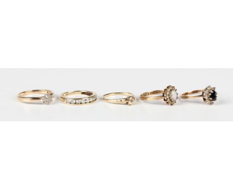A 9ct gold and diamond cluster ring, ring size approx O1/2, a 9ct gold and diamond single stone ring, a 9ct gold, opal and co