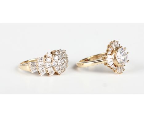 A 9ct gold and diamond cluster ring of tapered design, set with circular and baguette cut diamonds, ring size approx K, and a