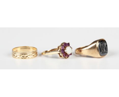 A 9ct gold, opal and amethyst cluster ring, London 1979, ring size approx P1/2, a 9ct gold and hematite intaglio ring, London