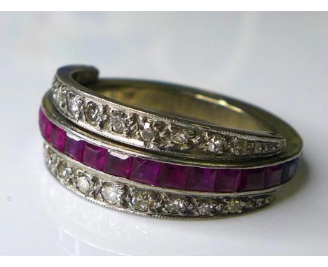 A blue sapphire, ruby and diamond night and day flip over eternity ring, set within an unmarked 18ct white gold band, incorpo