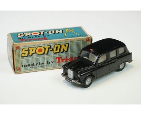 Boxed Triang Spot On No 155 Austin Taxi FX 4 diecast model in black, diecast vg with the odd mark, box fair with end flap rep