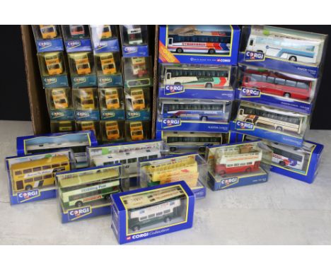 34 Boxed Corgi diecast model buses &amp; coaches, features some duplication, diecast ex with some discolouring to boxes (two 