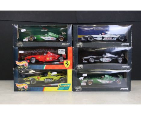 Six boxed Mattel Hot Wheels 1/18 F1 diecast models to include Jordan 199 Damon Hill, Michael Schumacher Collection 1999 Ferra