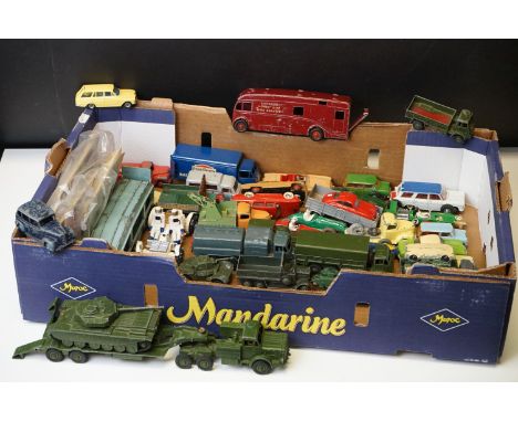 Around 40 mid 20th C play worn Dinky diecast models to include commercial, military, racing and road examples featuring Austi