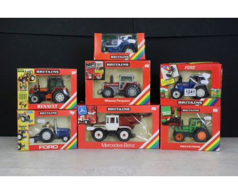 Collection of seven boxed Britains diecast metal and plastic model tractors, to include 9527 Ford Tractor 5610, 9520 Massey F