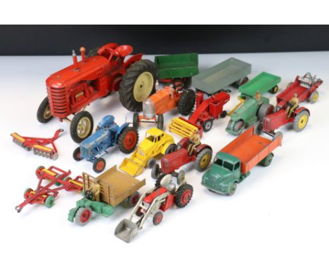 15 Mid 20th C play worn farming diecast models to include Dinky, Corgi and Matchbox to include a large scale Matchbox Massey 