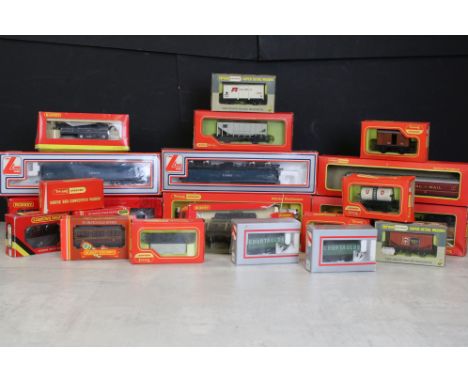 23 Boxed OO gauge items of rolling stock to include 9 x Triang Hornby, 4 x Lima, 7 x Hornby, 2 x Wrenn and 1 x Barry &amp; Pe