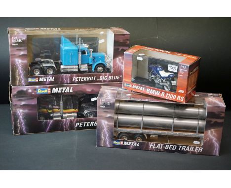 Four boxed 1/24 Revell Metal models to include 08891 Peterbilt 359, 08889 Peterbilt Big Blue, 0898 Flat-Bed Trailer and 08871