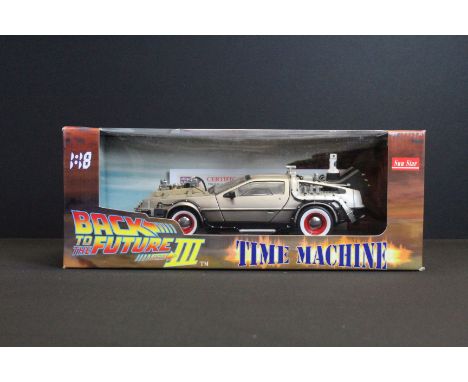 Boxed Sun Star 1/18 Back to the Future III Time Machine diecast model, signed to the windscreen by Christoper Lloyd with coa 