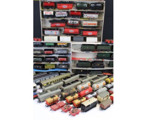 Over 80 OO gauge items of rolling stock to include tankers, tender, trucks and wagons featuring Triang, Hornby. Lima etc (6 t