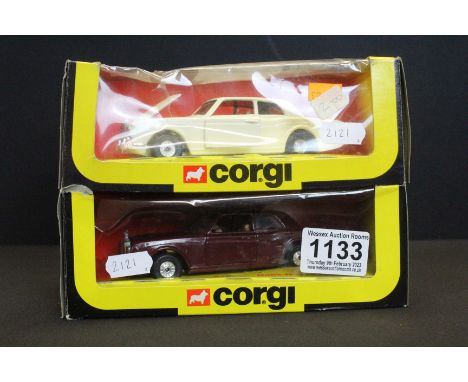 Two boxed Corgi 279 Rolls Royce Corniche diecast models in cream and maroon, diecast ex, boxes show some wear 