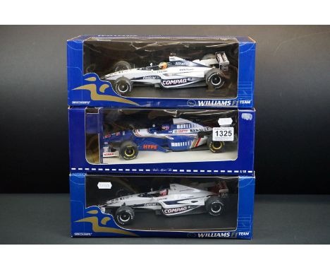 Three boxed Paul's Model Art Minichamps 1/18 diecast models to include 2 x Williams F1 Team (BMW FW 22 R. Schumacher (small b