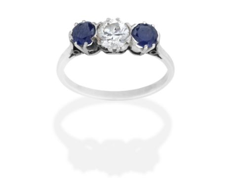 SAPPHIRE AND DIAMOND THREE-STONE RINGThe old brilliant-cut diamond, between two circular-cut sapphires, diamond approx. 0.50c