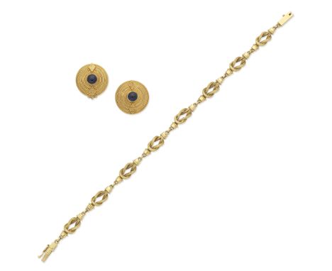 LALAOUNIS: BRACELET AND SAPPHIRE-SET EARCLIPS, CIRCA 19951st: The 18 carat gold fancy link bracelet of ropetwist, knot design