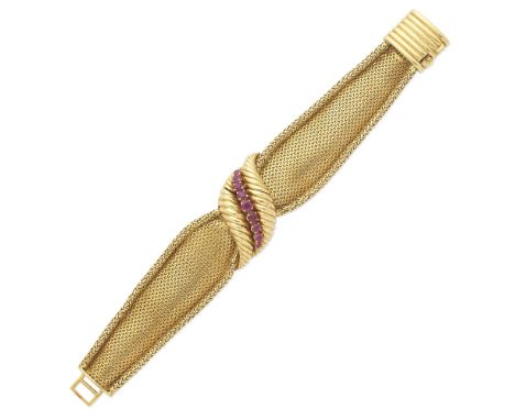 JAEGER-LECOULTRE: RUBY-SET WRISTWATCH, 1958Mounted in 18 carat gold, set with circular-cut rubies, dial signed Jaeger-LeCoult