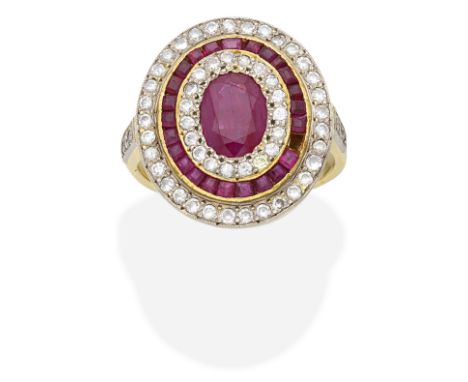 RUBY AND DIAMOND RINGThe oval-cut ruby within a surround of brilliant-cut diamonds and square-cut rubies, one ruby deficient,