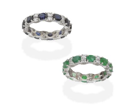 TWO GEM-SET ETERNITY RINGSEach set with brilliant-cut diamonds, and oval-cut sapphires or emeralds, ring size approx. NFor fu