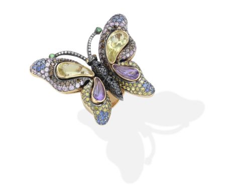 ZORAB: GEM AND DIAMOND-SET BUTTERFLY RINGSet with circular-cut vari-coloured sapphires, green garnet, black diamonds, fancy-c