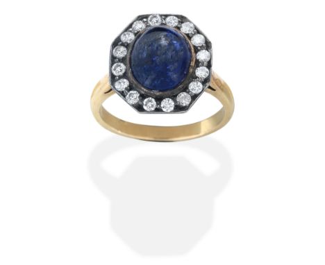 SAPPHIRE AND DIAMOND CLUSTER RINGSet with cabochon sapphire and brilliant-cut diamonds, sapphire approx. 2.90cts,  ring size 