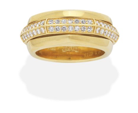 PIAGET: DIAMOND-SET 'POSSESSION' RING, CIRCA 1997Brilliant-cut diamonds set on a rotating central hoop, mounted in 18 carat g