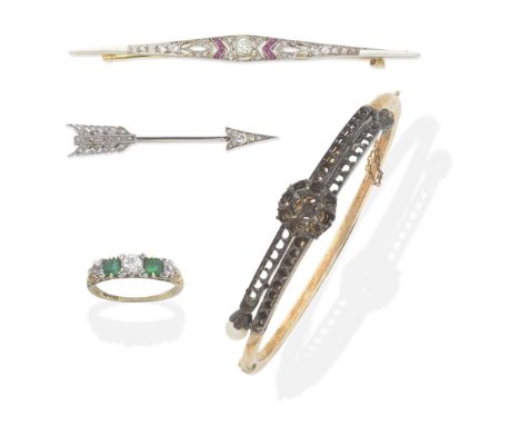 COLLECTION OF JEWELLERY, LATE 19TH - EARLY 20TH CENTURY1st: The bar brooch set with calibré-cut rubies and rose, single and o