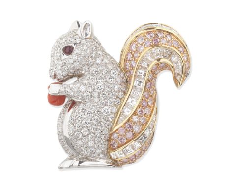 DIAMOND AND COLOURED DIAMOND SQUIRREL BROOCHThe squirrel holding a carved coral corallium rubrum nut, the face and body set w