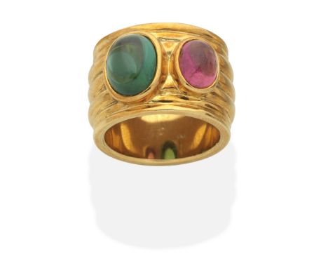 TOURMALINE-SET RINGCabochon green and pink tourmalines, ring size approx. K½ (leading edge)For further information on this lo