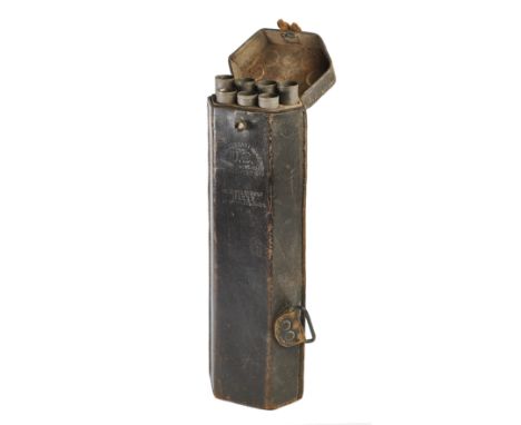 A RARE BLAKESLEE PATENT CARTRIDGE BOX COMPLETE WITH TEN METAL TUBES, CIRCA 1865-70 with leather-covered wooden core of hexago