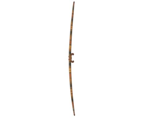 A SOUTH INDIAN BOW (AMBUM), PROBABLY KERALA with slightly curved wooden stave of circular section, decorated over its surface