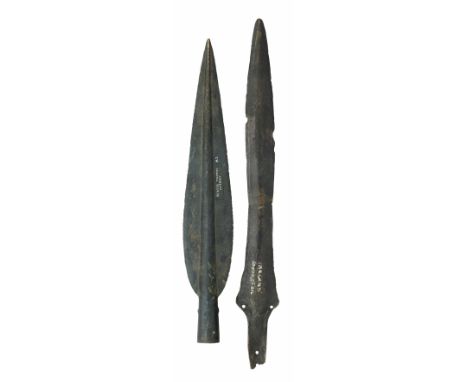 ‡ A COPPER ALLOY SPEARHEAD AND A COPPER ALLOY SHORTSWORD, 1300-800 B.C. in excavated condition, the first with leaf-shaped he