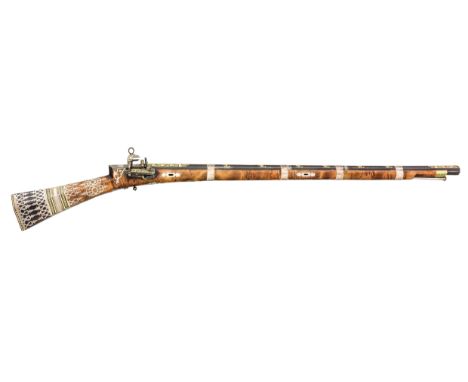A FINE 25 BORE OTTOMAN MIQUELET-LOCK RIFLE, TURKEY, CIRCA 1780 with octagonal barrel rifled with seven grooves, retained by f