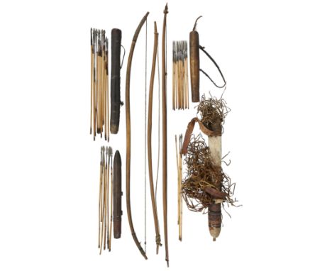 A NORTH AFRICAN SELF BOW, PROBABLY SUDAN, LATE 19TH/20TH CENTURY, TWO FURTHER AFRICAN BOWS, FOUR QUIVERS AND A QUANTITY OF AR