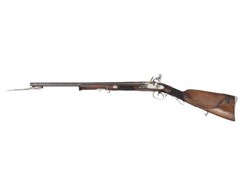 ‡ A 20 BORE CONTINENTAL D.B. FLINTLOCK SPORTING CARBINE IN THE FRENCH TASTE, CIRCA 1790-1800 with blued barrels formed in thr